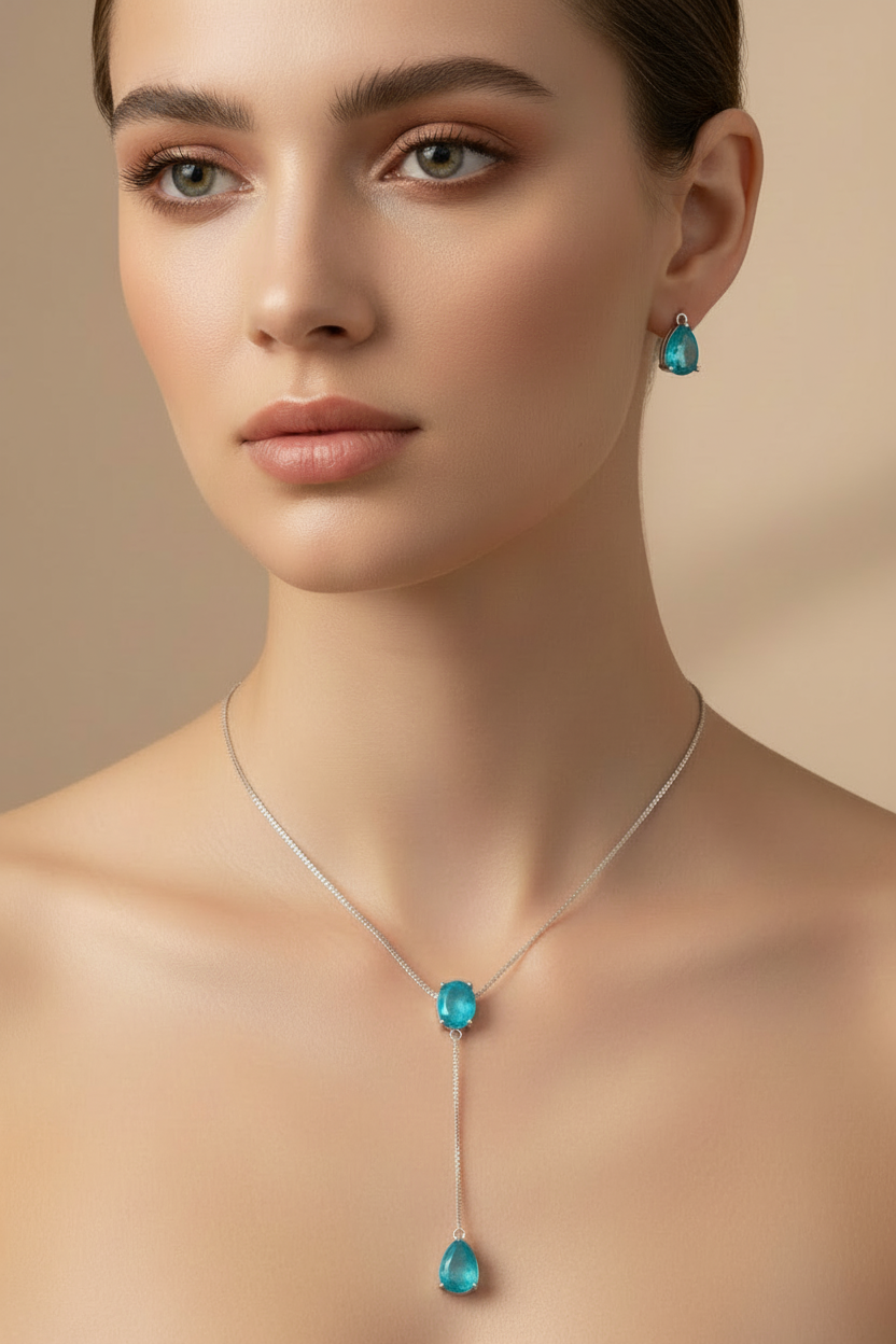 Necklace with turquoise stones on a white fabric background